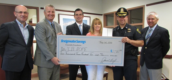 Left to right: Peter Dello Russo, Bridgewater Savings President and COO, John E. Cowan, EB HOPE Board of Directors member, Sean Varano, Professor at Roger Williams University, Susan J. Silva, EB HOPE President and Executive Director, Scott Allen, East Bridgewater Police Chief and James C. Lively, Bridgewater Savings CEO.