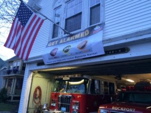 A banner hangs at the Pigeon Cove Fire Station encouraging residents to install Carbon Monoxide alarms in their homes. (Courtesy Photo)