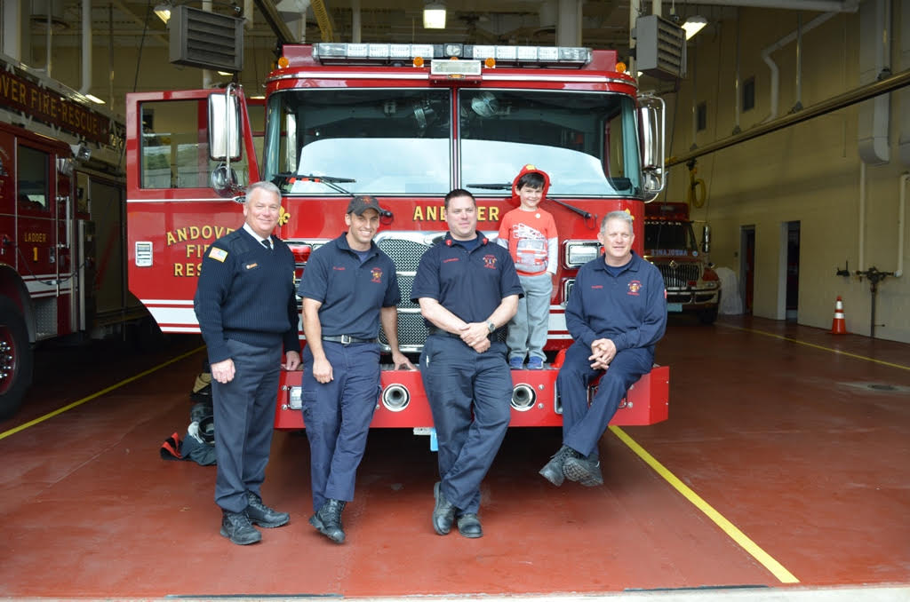 From left to right: Fire Chief Michael Mansfield, Firefighter Jeff Gaunt, Lt. Christopher Morgese, Charlie Delaney, and Firefighter Michael Surette.