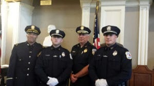 Left-to-right: Detective Lieutenant Scott Jones, graduating Bedford Police Officer Jason Kennedy, Bedford Police Chief Robert Bongiorno and graduating Bedford Police Officer Timothy Pike at the Great Hall at Faneuil Hall in Boston. (Courtesy Photo)