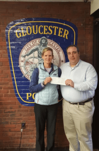P.A.A.R.I. recently received a $5,000 donation from the Forest Foundation. Left to right: Laney Makin, Program Coordinator at the Forest Foundation, and Gloucester Police Chief Leonard Campanello. (Courtesy photo)