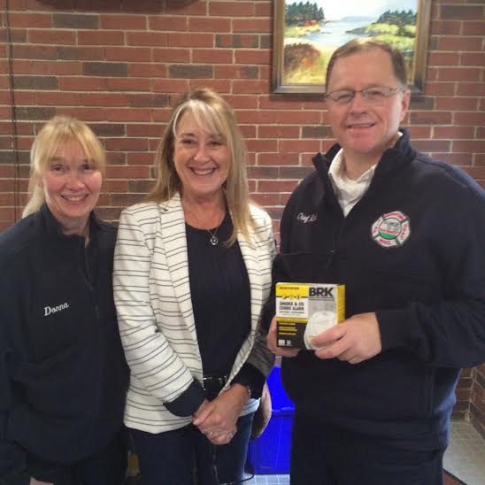 The Georgetown Fire Department donated $500 worth of smoke detectors to the Georgetown Housing Authority. Left to right: Firefighter Donna Robbins, Housing Authority Director Diane Drinan and Chief Fred Mitchell. (Courtesy Photo)