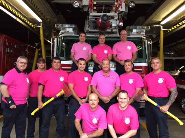 Members of the Gloucester Fire Department will be wearing pink shirts throughout October to support Breast Cancer Awareness Month. (Courtesy Photo)