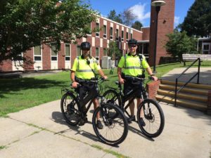 Officers Jeff Torrisi, left, and Nick Conway debut two new Polaris eBikes for the Methuen Police Department.