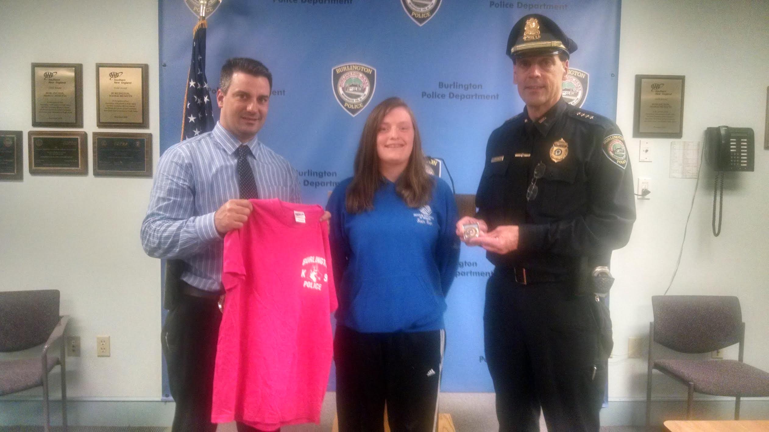 Pictured left-to-right are Burlington Police Detective Thomas Carlson, Merry Lapointe, and Burlington Police Chief Michael R. Kent. (Courtesy of the Burlington Police Department)
