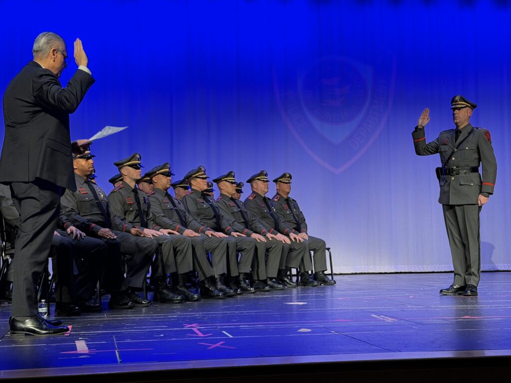  East Providence Mayor Roberto DaSilva swears in East Providence Police Chief Michael J. Rapoza on Tuesday evening during a Promotional Ceremony at East Providence High School. (Photo Courtesy East Providence Police Department)
